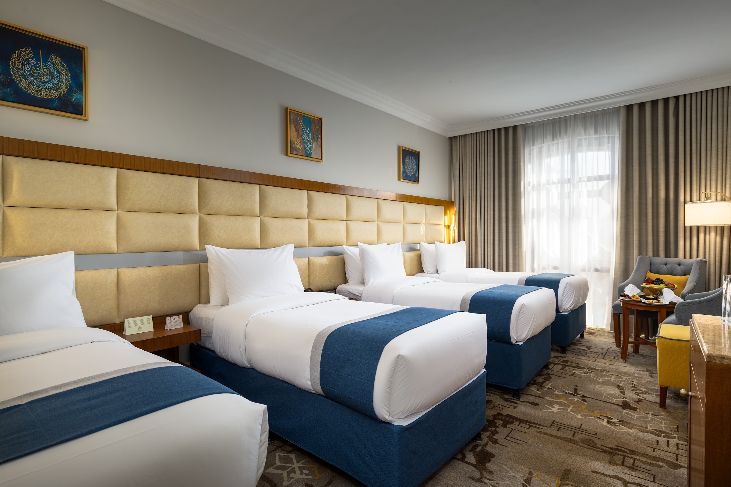 A room with three beds