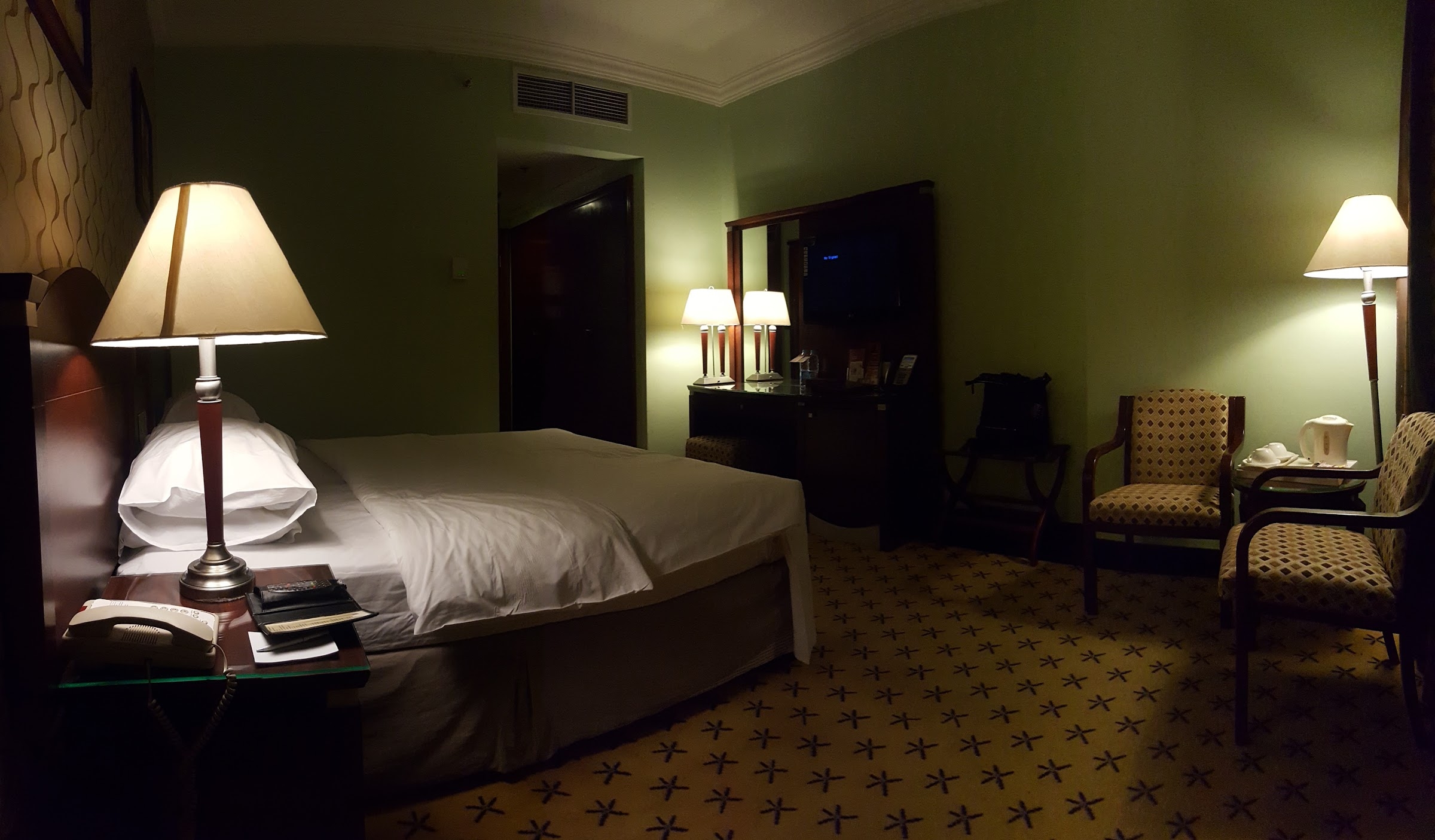 A room with a double bed