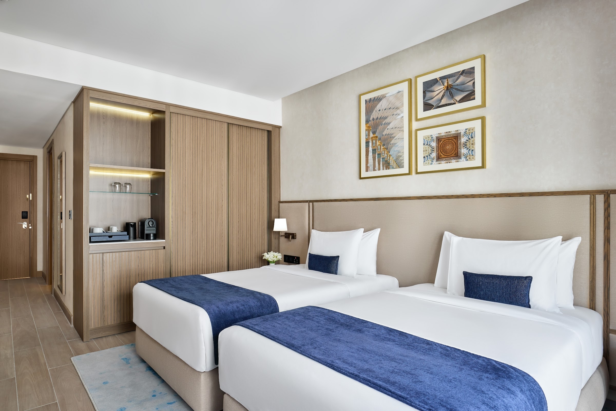 A room with two single beds