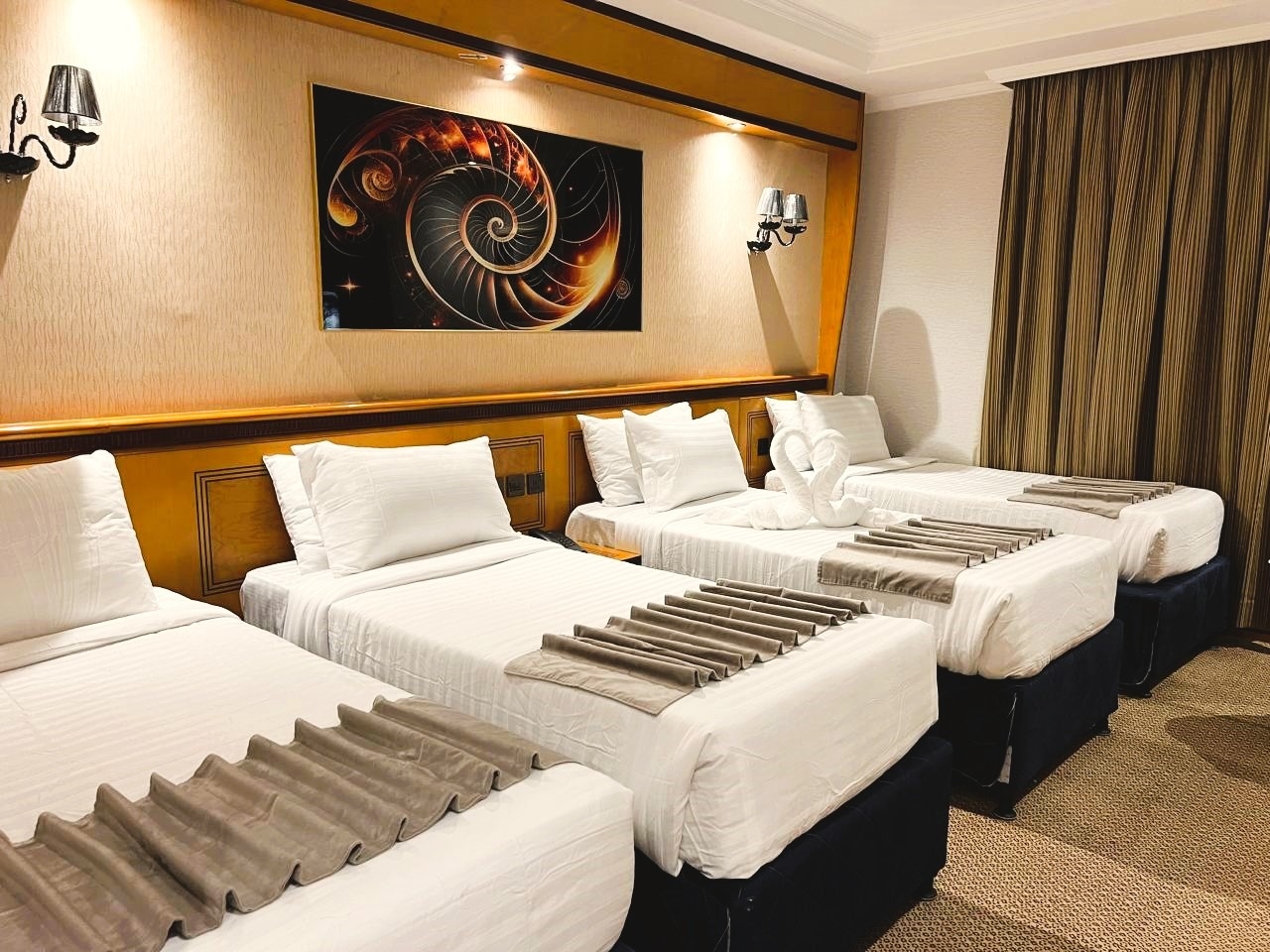 A room with four single beds