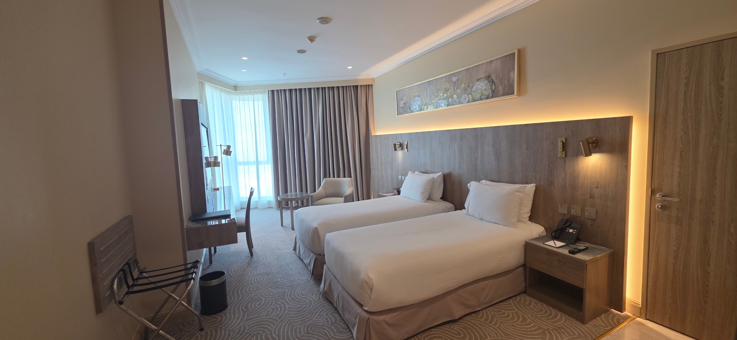 Kamar yang telah direnovasi dengan dua tempat tidur single