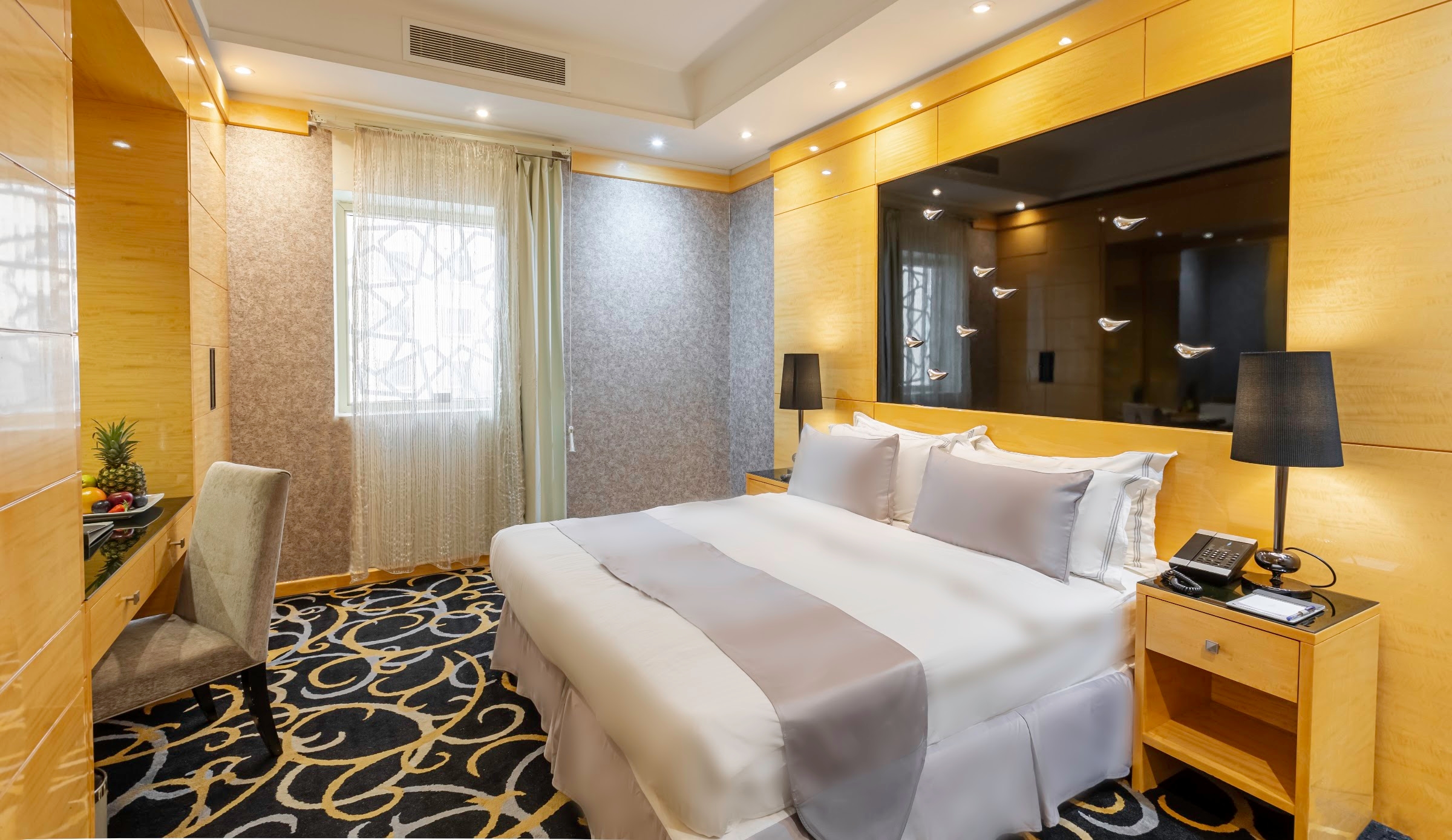 A room with a king bed