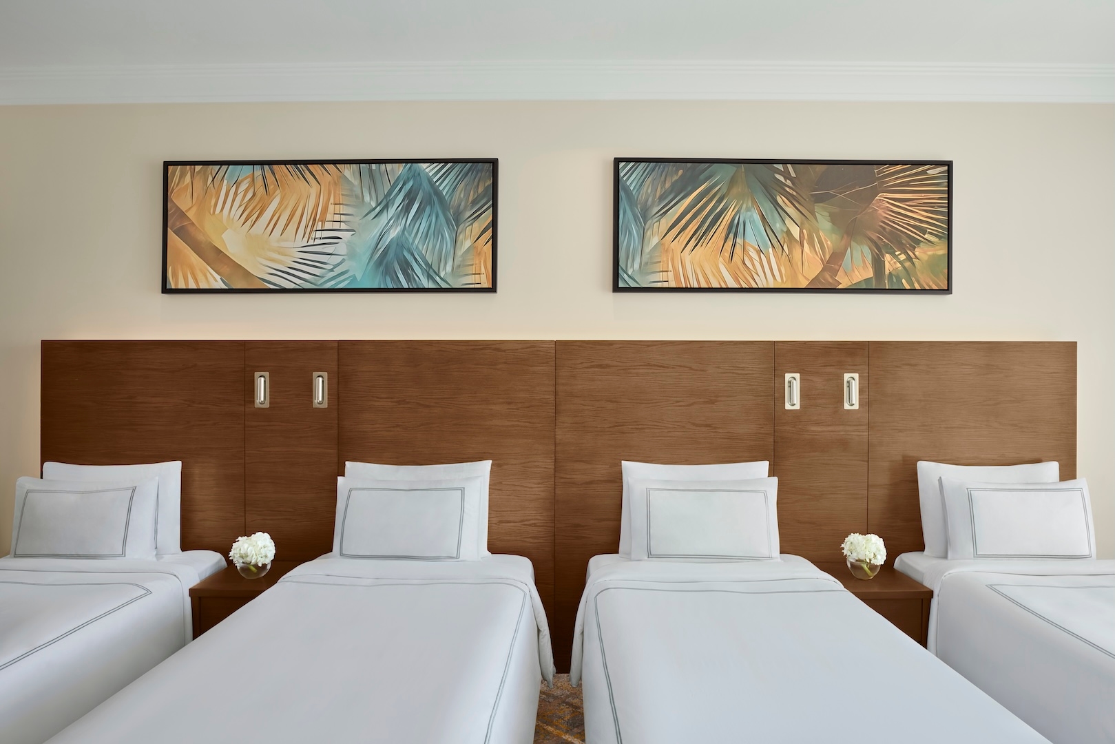 A room with four single beds
