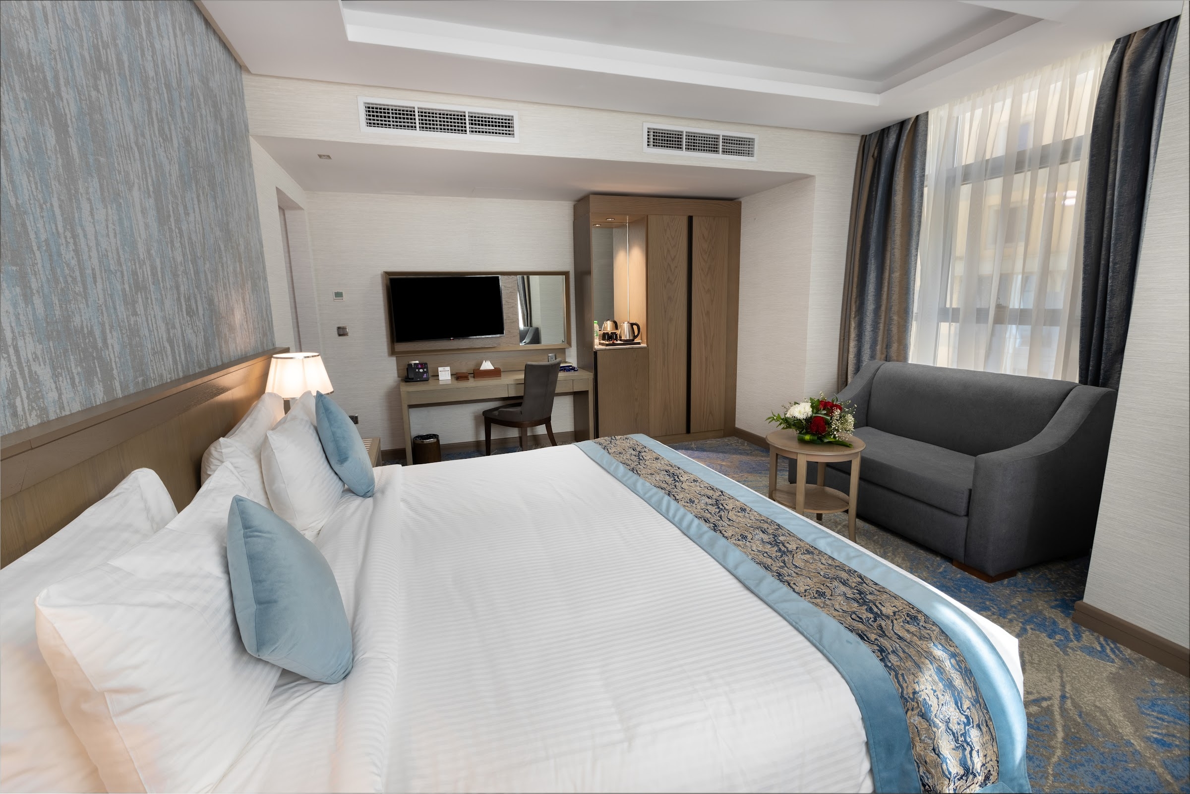 A room with a king bed