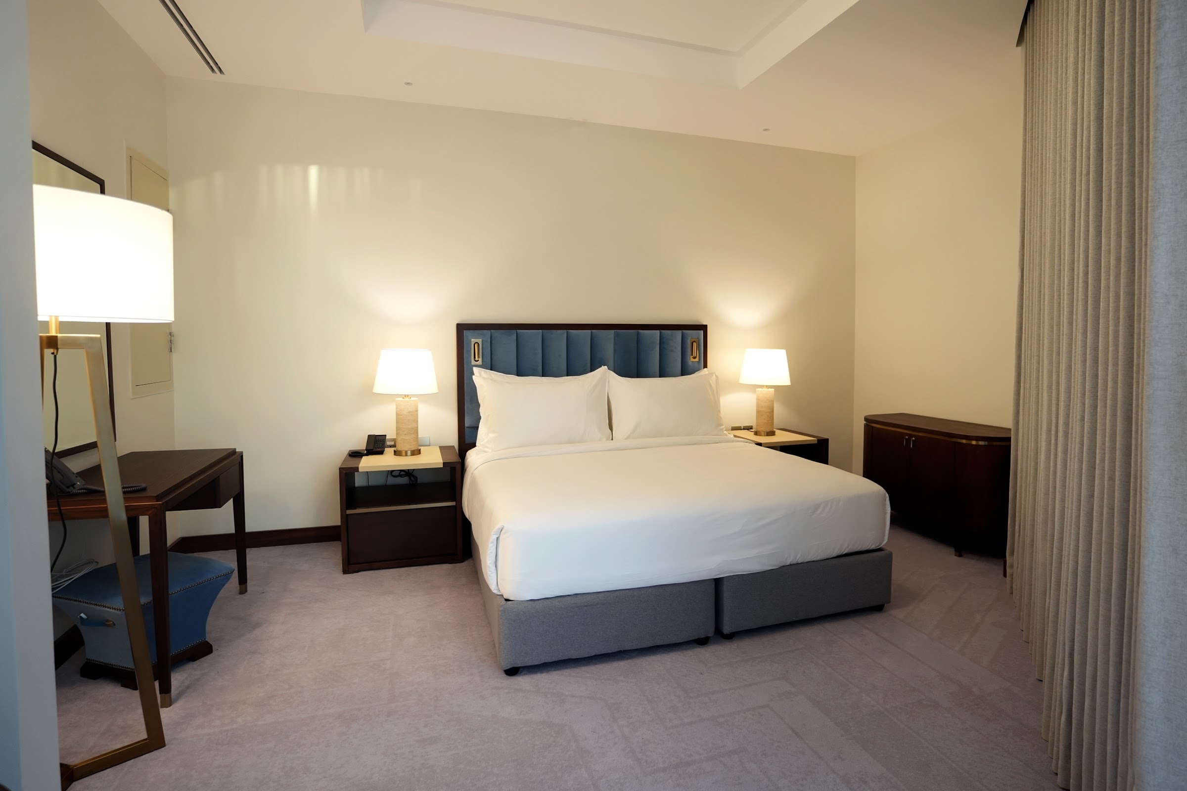 A room with a double bed
