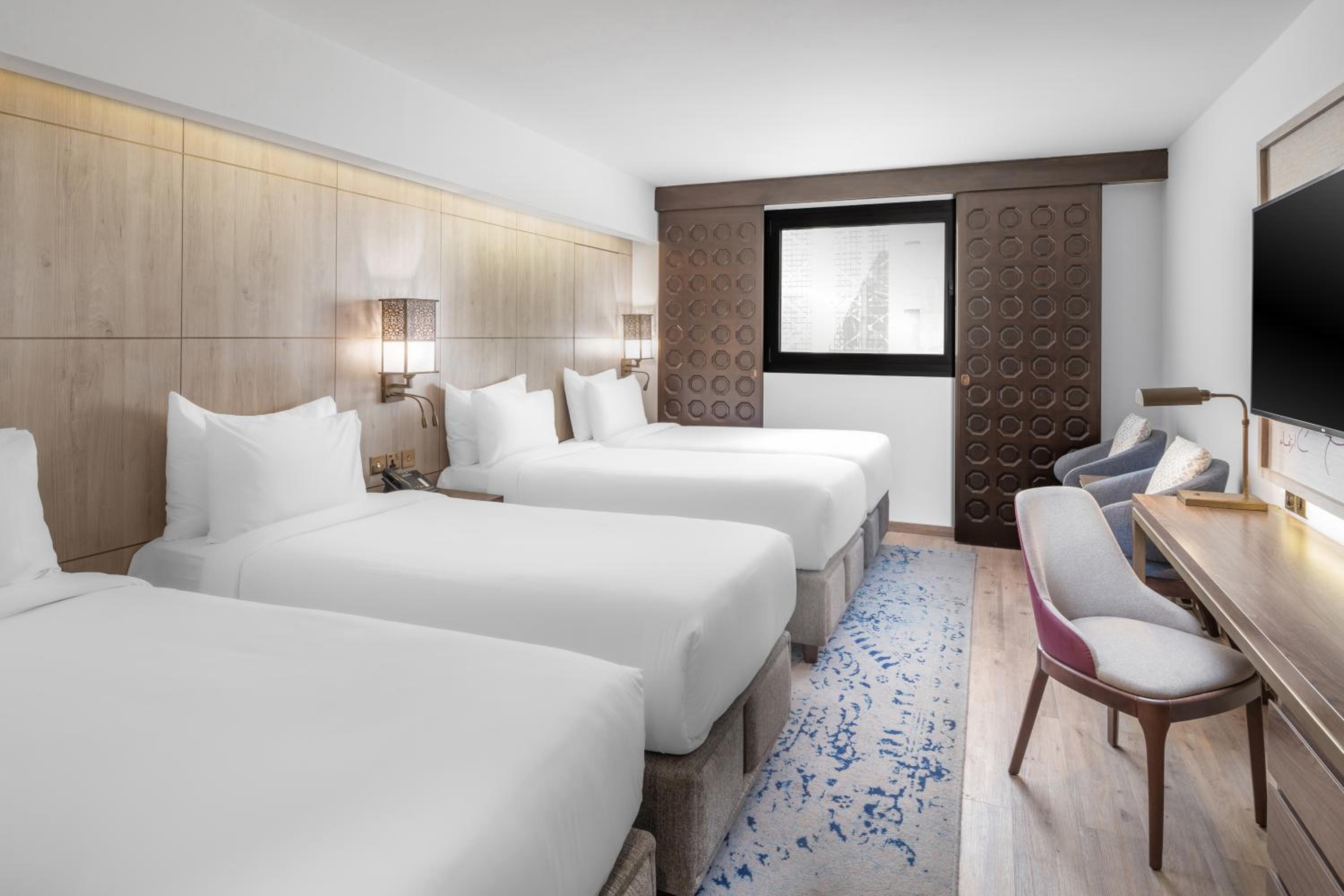 A room with four beds