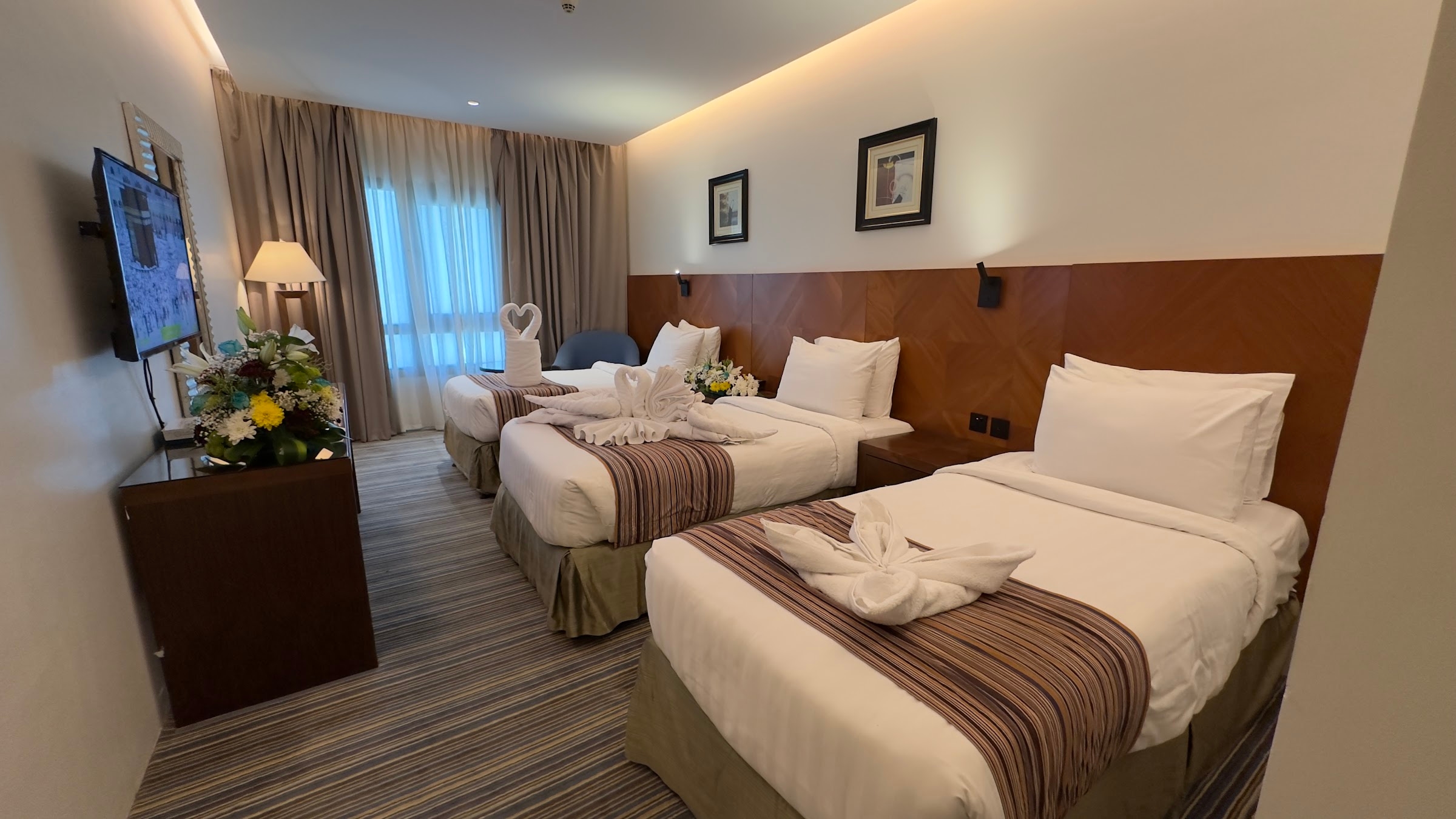 Kamar dengan tiga tempat tidur