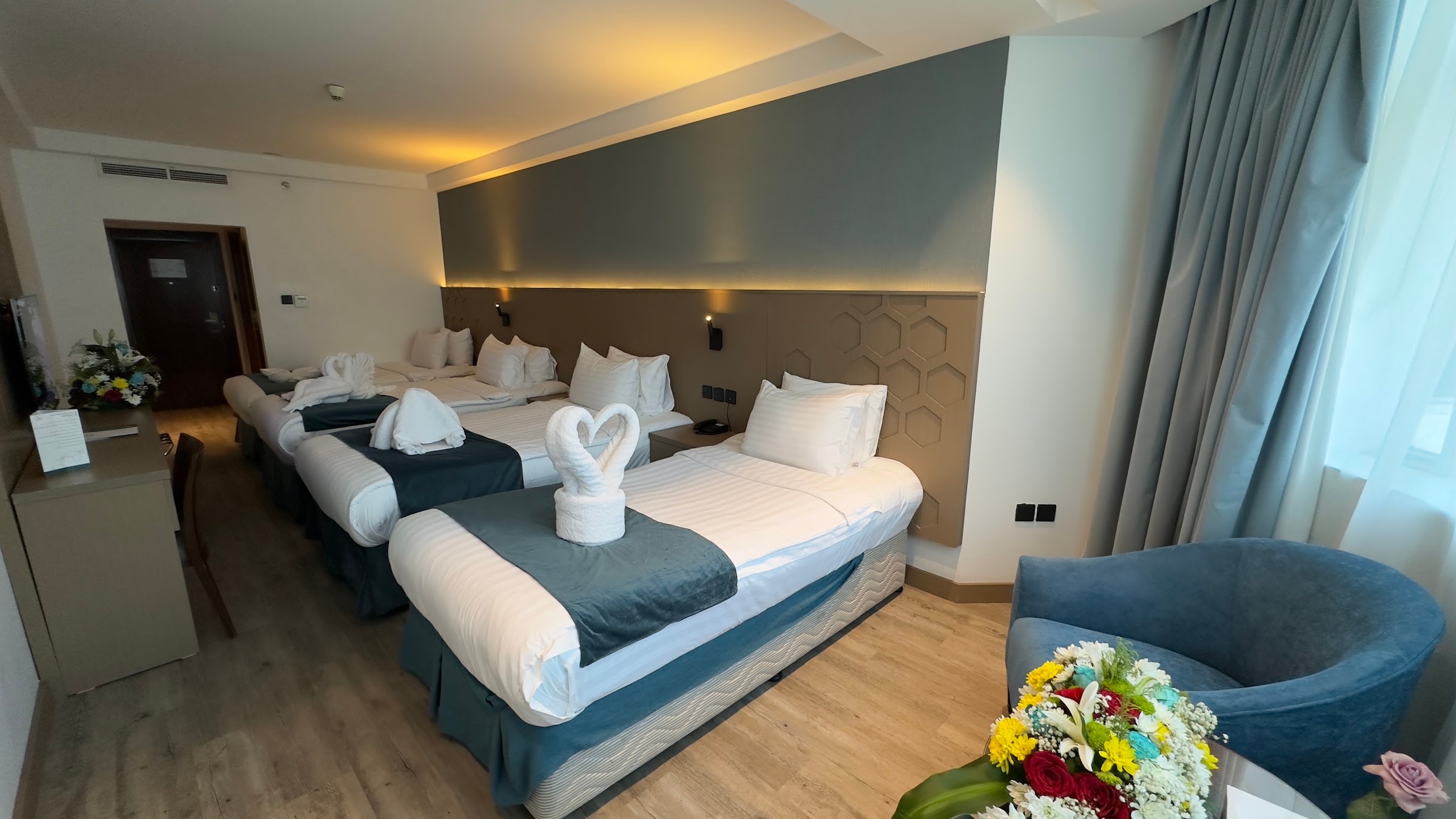 Kamar dengan tiga tempat tidur