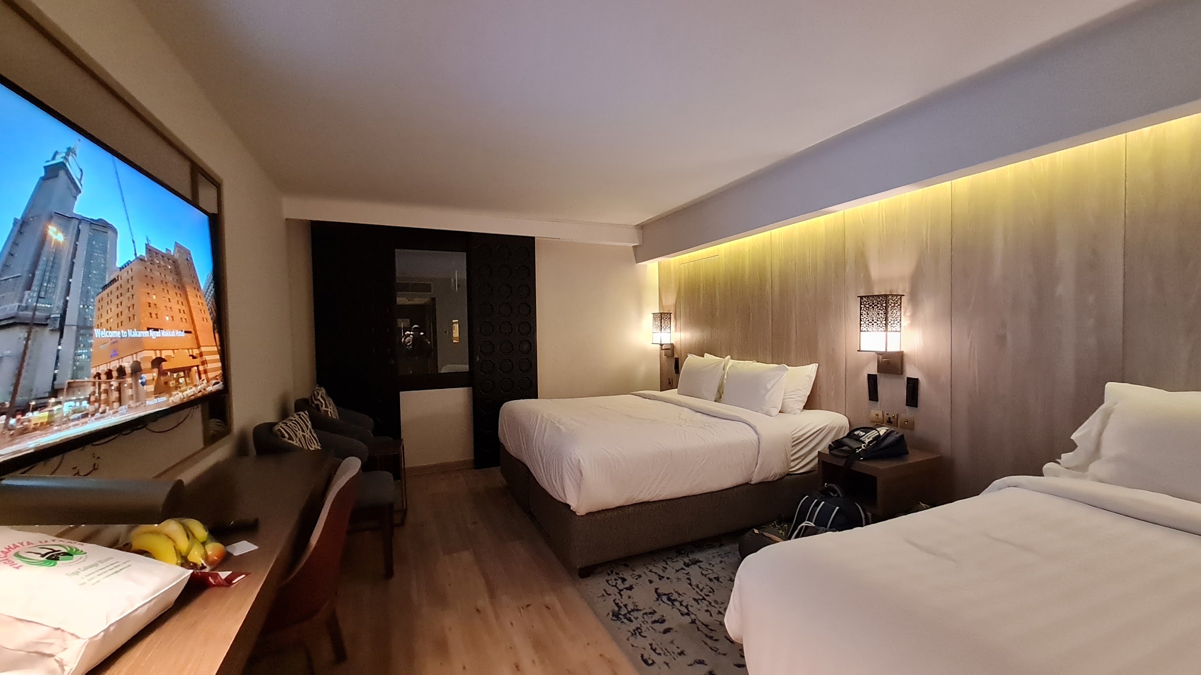 A guest room with two large beds
