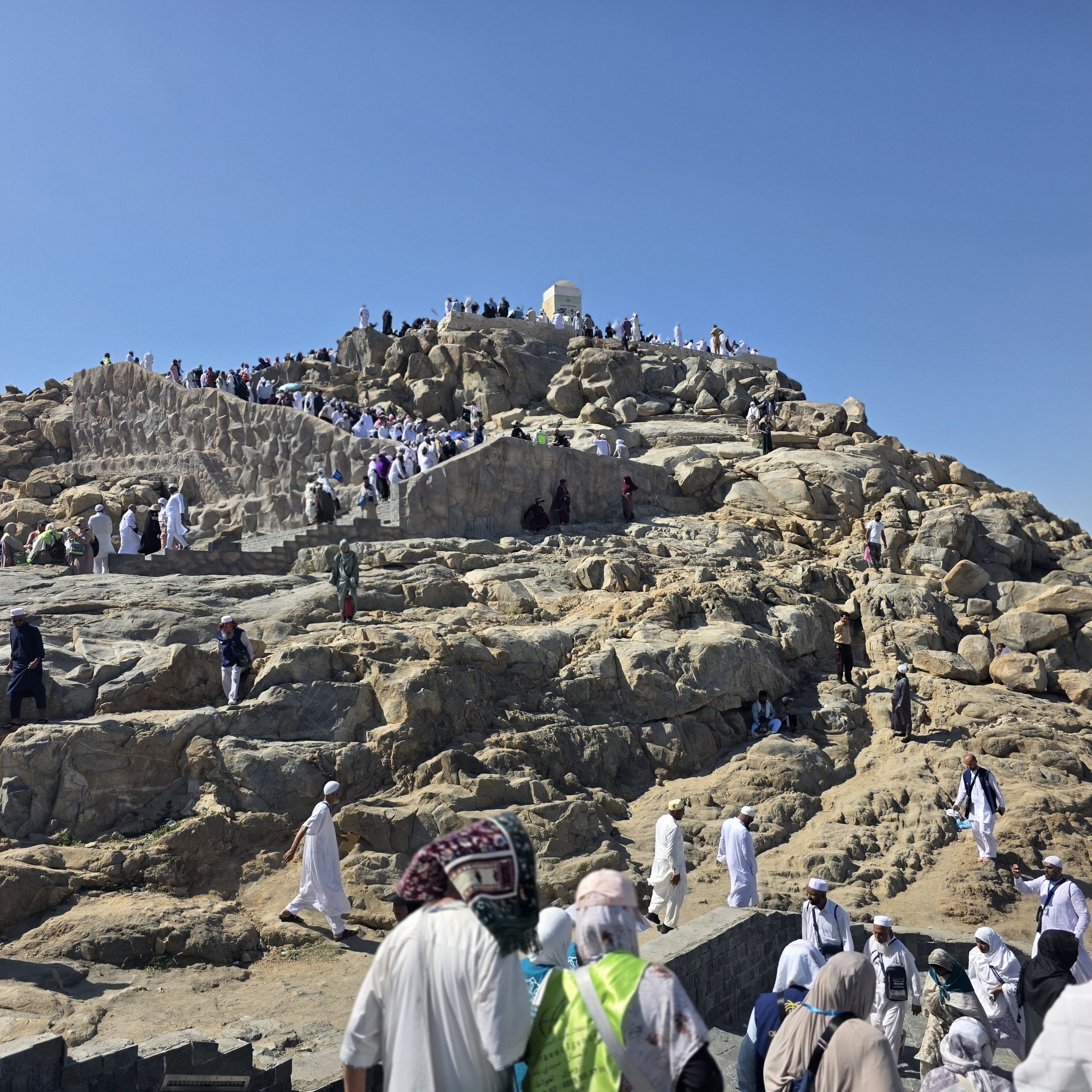 Visitors on Jabal al-Rahmah at Arafat